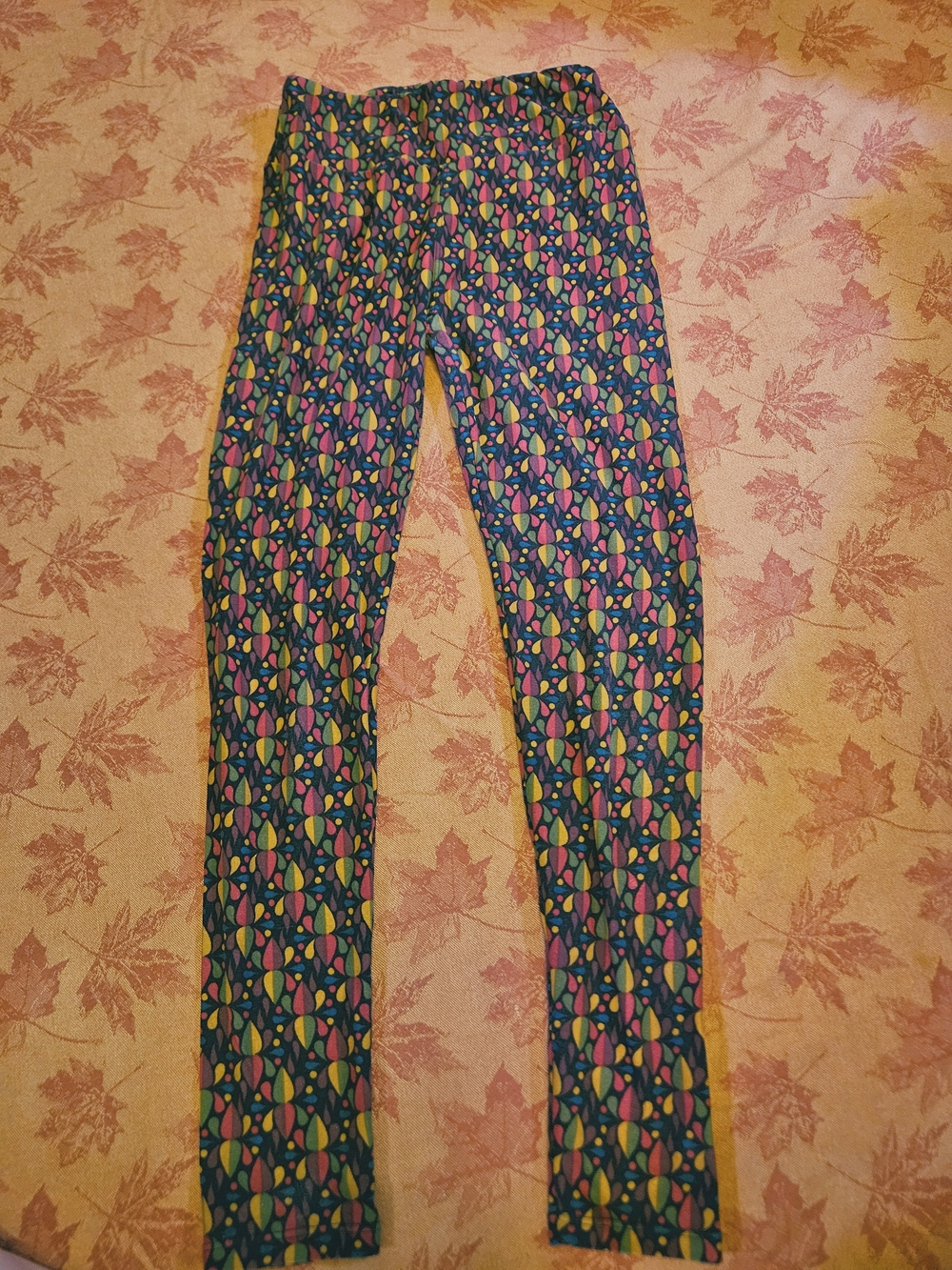LuLaRoe Navy Leggings with Multicolor Geometric Print